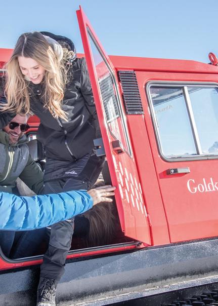 Guests get out of the Snowcat